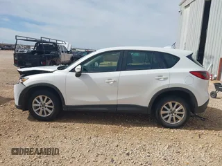 2016 Mazda CX-5 Sport with VIN JM3KE2BYXG0683318, listed as a IAAI auction lot 41777751 with 116,922 mi miles. Bid and sale history available at carsss.com. Image 14.