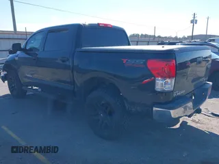 2013 Toyota Tundra 4WD Truck with VIN 5TFDW5F12DX309382, listed as a IAAI auction lot 41631661 with 158,821 mi miles. Bid and sale history available at carsss.com. Image 3.