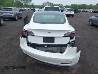 2023 Tesla Model 3 z VIN 5YJ3E1EA6PF570876, wystawiony jako IAAI lot #42366310 z przebiegiem 13 005 mil mil oraz . Historia ofert i sprzedaży dostępna na DreamBid. Obrazek 16.