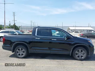 2020 Honda Ridgeline RTL-E with VIN 5FPYK3F70LB009376, listed as a IAAI auction lot 42488529 with 30,932 mi miles and . Bid and sale history available at DreamBid. Image 13.
