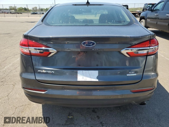 2020 Ford Fusion SE z VIN 3FA6P0HD3LR252722, wystawiony jako Copart lot #54243945 z przebiegiem 29 076 mil mil oraz Szkoda całkowita • Salvage title. Historia ofert i sprzedaży dostępna na DreamBid. Obrazek 6.
