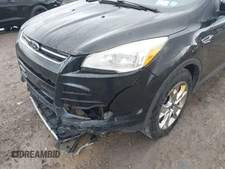 2013 Ford Escape SEL with VIN 1FMCU9HX9DUA69853, listed as a IAAI auction lot 42037021 with 132,166 mi miles and . Bid and sale history available at DreamBid. Image 6.