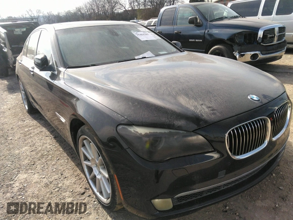 2011 BMW 7 Series 740i with VIN WBAKA4C55BC612634, listed as a IAAI auction lot 35404385 with 156,003 mi miles. Bid and sale history available at carsss.com. Image 1.