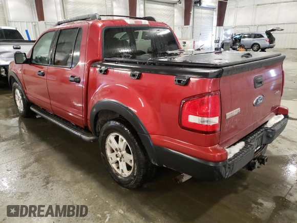 2007 Ford Explorer Sport Trac XLT with VIN 1FMEU518X7UA04941, listed as a Copart auction lot 83841834 with 153,039 mi miles and Salvage title. Bid and sale history available at DreamBid. Image 2.