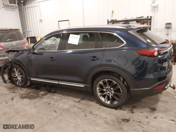 2016 Mazda CX-9 Grand Touring with VIN JM3TCBDY9G0109770, listed as a IAAI auction lot 41551085 with 131,812 mi miles. Bid and sale history available at carsss.com. Image 15.