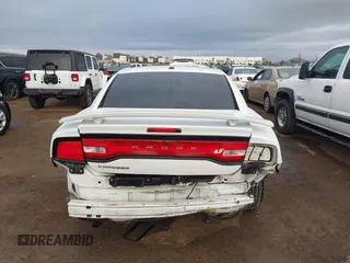 2013 Dodge Charger SE with VIN 2C3CDXBG1DH742921, listed as a IAAI auction lot 41765001 with 196,783 mi miles and . Bid and sale history available at DreamBid. Image 17.
