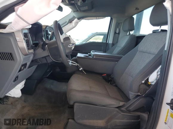 2023 Ford F-150 XL with VIN 1FTMF1C5XPKE35376, listed as a Copart auction lot 57109915 with 25,832 mi miles and Salvage title. Bid and sale history available at DreamBid. Image 7.