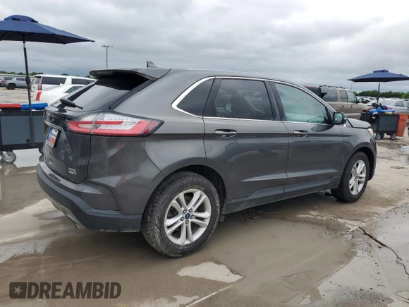 2019 Ford Edge SEL z VIN 2FMPK4J92KBB21770, wystawiony jako Copart lot #56056585 z przebiegiem 64 042 mil mil oraz Szkoda całkowita • Salvage title. Historia ofert i sprzedaży dostępna na DreamBid. Obrazek 3.