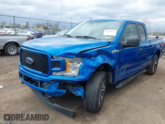 2019 Ford F-150 XL with VIN 1FTEX1EP3KFA11345, listed as a IAAI auction lot 42036915 with 136,608 mi miles. Bid and sale history available at carsss.com. Image 2.