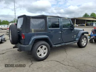 2008 Jeep Wrangler Unlimited Sahara with VIN 1J4GA59108L562831, listed as a Copart auction lot 58949225 with 206,312 mi miles and Clean title. Bid and sale history available at DreamBid. Image 3.