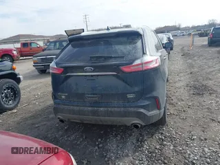 2019 Ford Edge SEL z VIN 2FMPK4J9XKBC58603, wystawiony jako IAAI lot #41814067 z przebiegiem 135 198 mil mil oraz . Historia ofert i sprzedaży dostępna na DreamBid. Obrazek 16.