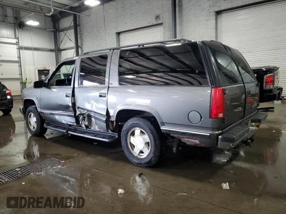 1999 Chevrolet Suburban with VIN 3GNFK16R8XG149091, listed as a Copart auction lot 71300024 with 254,044 mi miles and Salvage Title. Bid and sale history available at carsss.com. Image 2.
