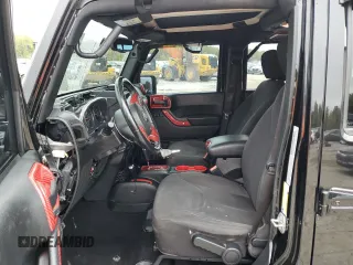 2018 Jeep Wrangler JK Unlimited Sport S with VIN 1C4HJWDGXJL837610, listed as a Copart auction lot 79299724 with 101,437 mi miles and Salvage Title. Bid and sale history available at carsss.com. Image 7.