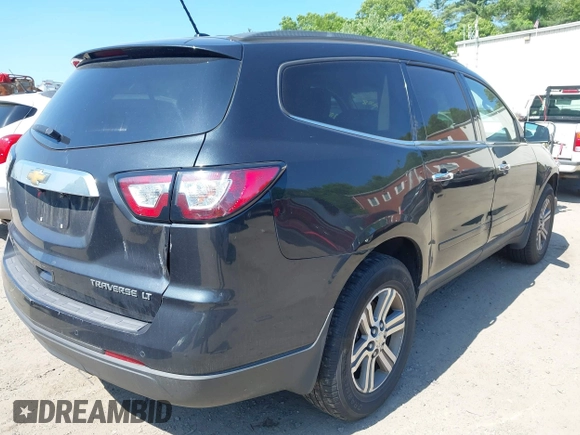 2015 Chevrolet Traverse LT z VIN 1GNKRGKD1FJ229238, wystawiony jako IAAI lot #42543288 z przebiegiem 285 667 mil mil oraz . Historia ofert i sprzedaży dostępna na DreamBid. Obrazek 4.