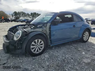 2017 Volkswagen Beetle 1.8T S with VIN 3VWF17AT6HM606269, listed as a Copart auction lot 85122254 with 86,926 mi miles and Non Repairable. Bid and sale history available at carsss.com. Image 1.