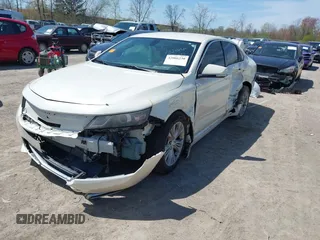 2014 Chevrolet Impala LT with VIN 2G1115SL4E9222651, listed as a IAAI auction lot 42066230 with 190,679 mi miles and . Bid and sale history available at DreamBid. Image 2.