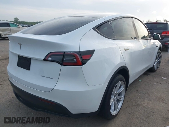 2023 Tesla Model Y Long Range with VIN 7SAYGDEE4PF770307, listed as a IAAI auction lot 42141175 with 34,901 mi miles and . Bid and sale history available at carsss.com. Image 4.