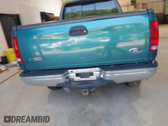 1998 Ford F-150 XL with VIN 1FTRX18L5WNB23716, listed as a IAAI auction lot 42579695 with 305,363 mi miles and . Bid and sale history available at DreamBid. Image 16.