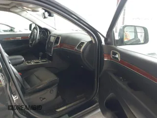 2012 Jeep Grand Cherokee Limited z VIN 1C4RJFBT1CC312006, wystawiony jako IAAI lot #42247170 z przebiegiem 233 890 mil mil oraz . Historia ofert i sprzedaży dostępna na DreamBid. Obrazek 5.