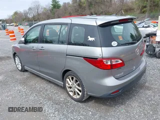 2012 Mazda 5 Touring with VIN JM1CW2CLXC0100740, listed as a IAAI auction lot 41918794 with 234,102 mi miles and . Bid and sale history available at DreamBid. Image 3.