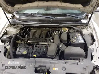 2013 Ford Taurus Limited with VIN 1FAHP2F83DG116657, listed as a IAAI auction lot 41533075 with 124,649 mi miles. Bid and sale history available at carsss.com. Image 10.