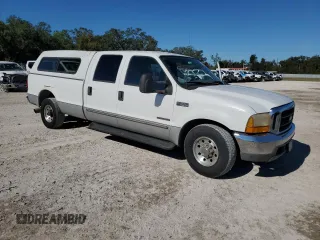 1999 Ford F-350 XL with VIN 1FTSW30F3XEE22631, listed as a Copart auction lot 83521754 with 368,980 mi miles and Salvage title. Bid and sale history available at DreamBid. Image 4.