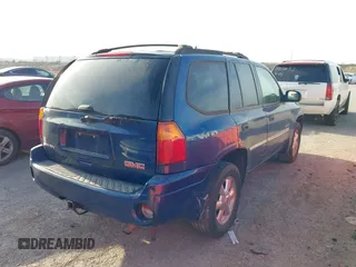 2006 GMC Envoy SLE with VIN 1GKDS13SX62315193, listed as a IAAI auction lot 41866029 with 231,164 mi miles. Bid and sale history available at carsss.com. Image 4.