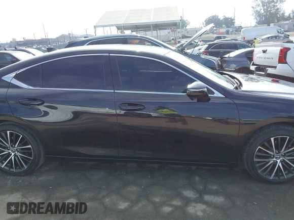 2024 Lexus ES 300h with VIN 58ADA1C14RU037328, listed as a IAAI auction lot 42334595 with 62,858 mi miles and . Bid and sale history available at DreamBid. Image 14.