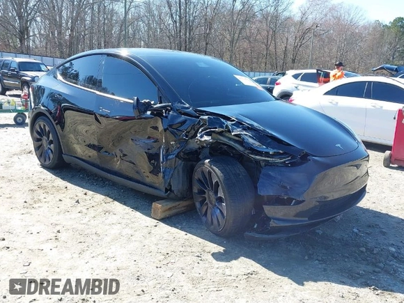 2021 Tesla Model Y Performance with VIN 5YJYGDEF6MF252877, listed as a IAAI auction lot 41770770 with 58,550 mi miles and . Bid and sale history available at DreamBid. Image 1.