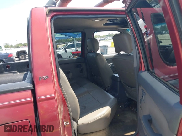 2000 Nissan Frontier XE z VIN 1N6ED27Y3YC382842, wystawiony jako IAAI lot #42343459 z przebiegiem 172 454 mil mil oraz . Historia ofert i sprzedaży dostępna na DreamBid. Obrazek 8.