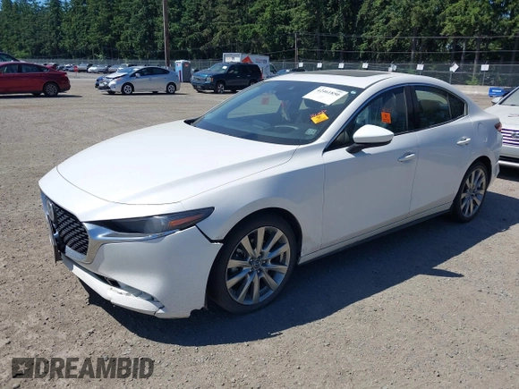 2021 Mazda 3 with VIN JM1BPBDL6M1340029, listed as a IAAI auction lot 42461850 with 79,798 mi miles and . Bid and sale history available at DreamBid. Image 2.