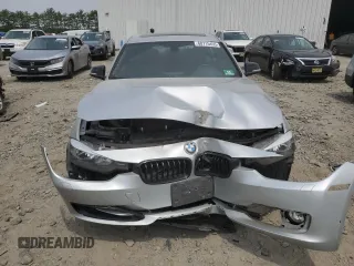 2013 BMW 3 Series 328i xDrive z VIN WBA3B3C57DJ811761, wystawiony jako Copart lot #60715455 z przebiegiem 111 198 mil mil oraz Szkoda całkowita • Salvage title. Historia ofert i sprzedaży dostępna na DreamBid. Obrazek 5.