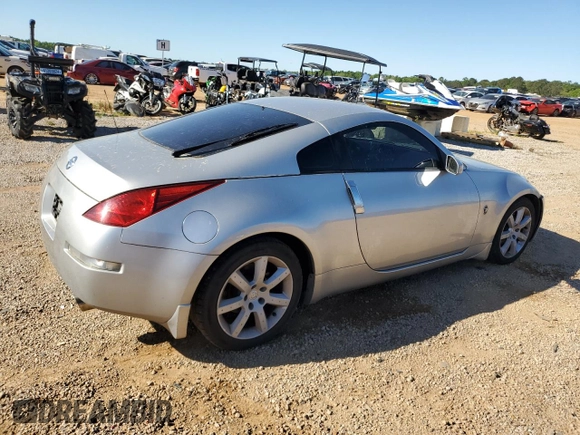 2004 Nissan 350Z Touring with VIN JN1AZ34E54T061403, listed as a Copart auction lot 57346704 with 127,602 mi miles and Salvage Title. Bid and sale history available at carsss.com. Image 3.