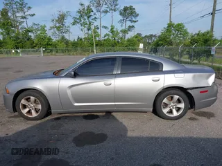 2014 Dodge Charger SE with VIN 2C3CDXBGXEH284832, listed as a IAAI auction lot 42069294 with 186,273 mi miles and . Bid and sale history available at carsss.com. Image 14.