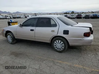 1996 Toyota Camry DX with VIN 4T1BG12K0TU809838, listed as a Copart auction lot 48985365 with 194,822 mi miles and Salvage Title. Bid and sale history available at carsss.com. Image 2.