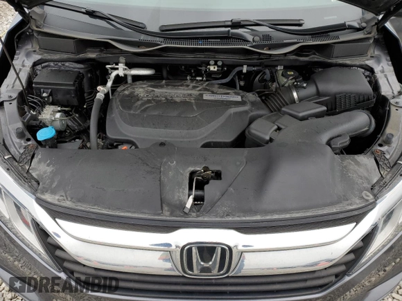 2018 Honda Odyssey EX-L with VIN 5FNRL6H78JB091153, listed as a Copart auction lot 52743715 with 69,849 mi miles and Salvage Title. Bid and sale history available at DreamBid. Image 12.