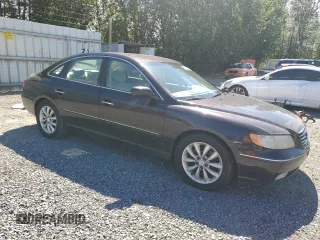 2007 Hyundai Azera SE z VIN KMHFC46F17A171733, wystawiony jako Copart lot #59060595 z przebiegiem 156 218 mil mil oraz Czysty tytuł • Clean title. Historia ofert i sprzedaży dostępna na DreamBid. Obrazek 4.