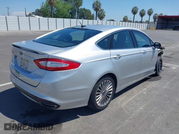 2014 Ford Fusion Titanium with VIN 3FA6P0K96ER248025, listed as a IAAI auction lot 42189061 with 64,351 mi miles and . Bid and sale history available at DreamBid. Image 4.