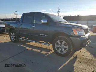 2014 Nissan Titan S with VIN 1N6AA0EC2EN511673, listed as a Copart auction lot 41703295 with 81,662 mi miles and Salvage Title. Bid and sale history available at DreamBid. Image 4.