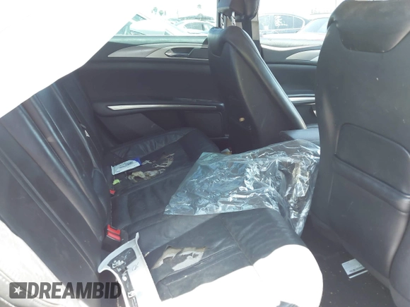 2016 Lincoln MKZ Hybrid z VIN 3LN6L2LU5GR613636, wystawiony jako IAAI lot #42613605 z przebiegiem Nie podano mil oraz . Historia ofert i sprzedaży dostępna na DreamBid. Obrazek 8.