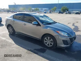 2010 Mazda 3 i Sport with VIN JM1BL1SG2A1282671, listed as a IAAI auction lot 41242441 with 184,947 mi miles and . Bid and sale history available at carsss.com. Image 1.
