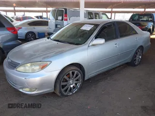 2003 Toyota Camry LE with VIN JTDBE32K730176610, listed as a IAAI auction lot 41627010 with 238,502 mi miles and . Bid and sale history available at DreamBid. Image 2.