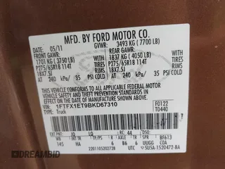 2011 Ford F-150 XL with VIN 1FTFX1ET9BKD67310, listed as a IAAI auction lot 42016119 with 147,114 mi miles. Bid and sale history available at carsss.com. Image 9.