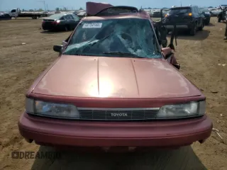 1989 Toyota Camry LE ECT z VIN JT2SV22E9K3372302, wystawiony jako Copart lot #68754144 z przebiegiem 341 387 mil mil oraz Nie do naprawy • Non repairable. Historia ofert i sprzedaży dostępna na DreamBid. Obrazek 5.
