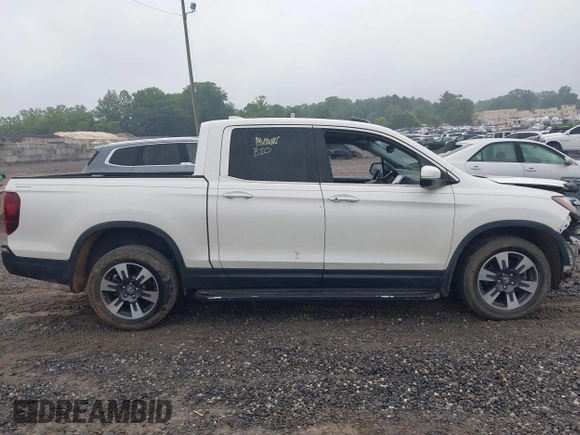 2018 Honda Ridgeline RTL-E with VIN 5FPYK3F77JB017293, listed as a IAAI auction lot 42422614 with 87,700 mi miles and . Bid and sale history available at DreamBid. Image 13.