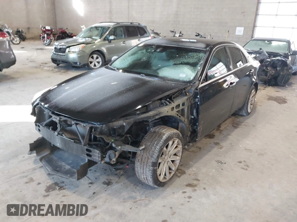 2014 Cadillac CTS Luxury AWD with VIN 1G6AX5S31E0143179, listed as a IAAI auction lot 41421639 with 135,810 mi miles and . Bid and sale history available at DreamBid. Image 2.