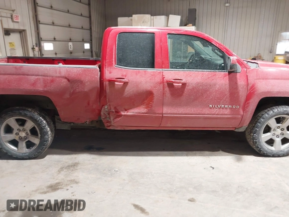 2018 Chevrolet Silverado 1500 LT with VIN 1GCVKREC0JZ217603, listed as a IAAI auction lot 41398543 with 109,503 mi miles and . Bid and sale history available at DreamBid. Image 13.