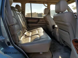 2002 Lexus LX 470 z VIN JTJHT00W723519186, wystawiony jako Copart lot #70190464 z przebiegiem 306 793 mil mil oraz Tytuł czysty. Historia ofert i sprzedaży dostępna na DreamBid. Obrazek 11.