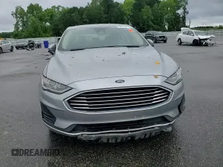 2020 Ford Fusion SE z VIN 3FA6P0HD0LR256243, wystawiony jako Copart lot #56513215 z przebiegiem 59 996 mil mil oraz Szkoda całkowita • Salvage title. Historia ofert i sprzedaży dostępna na DreamBid. Obrazek 13.