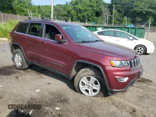 2017 Jeep Grand Cherokee Laredo with VIN 1C4RJFAG8HC940849, listed as a Copart auction lot 59868025 with 111,743 mi miles and Salvage title. Bid and sale history available at DreamBid. Image 4.